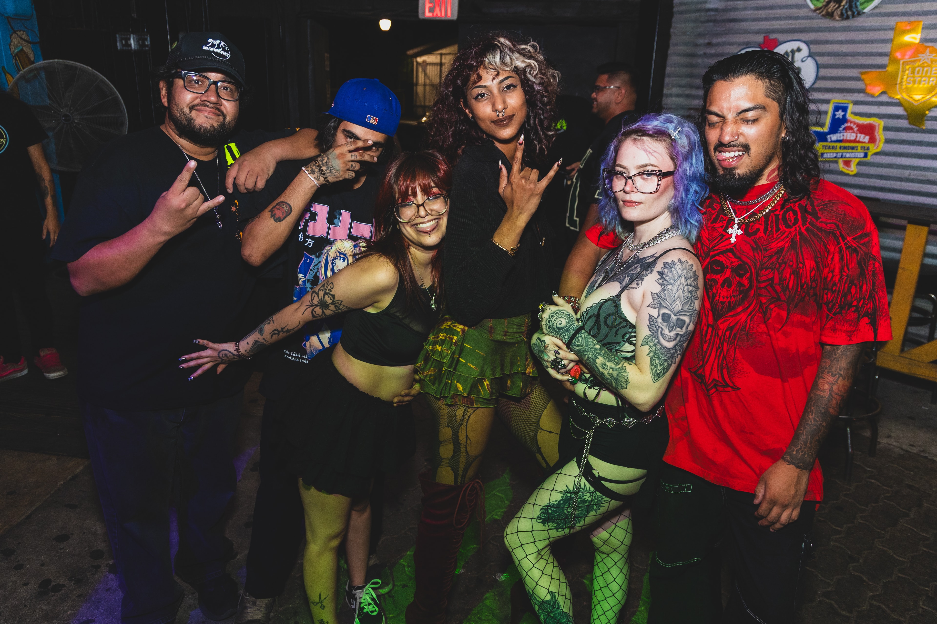 Group throwing up horns at SATX Emo Club