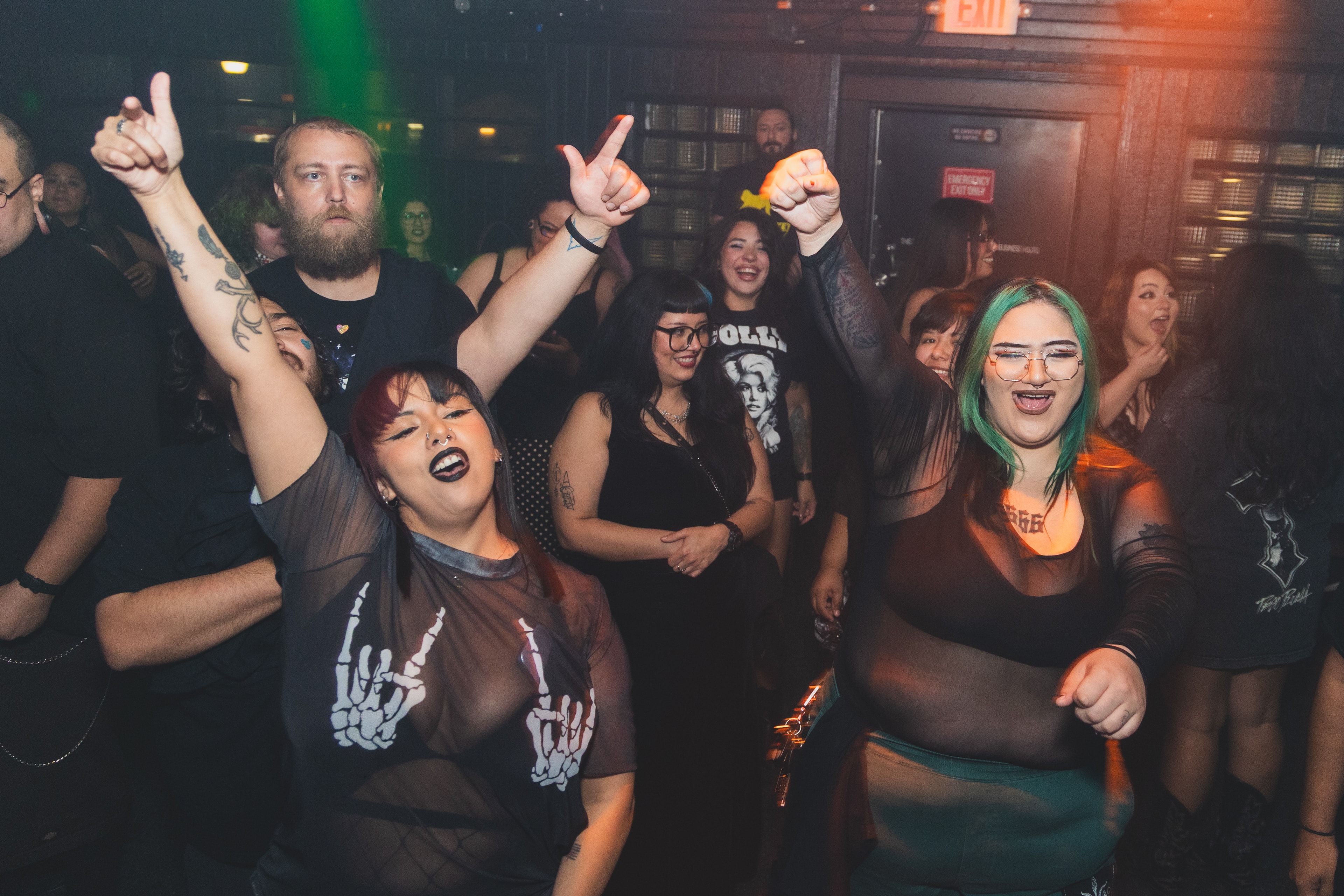 Crowd dancing and singing along at SATX Emo Club
