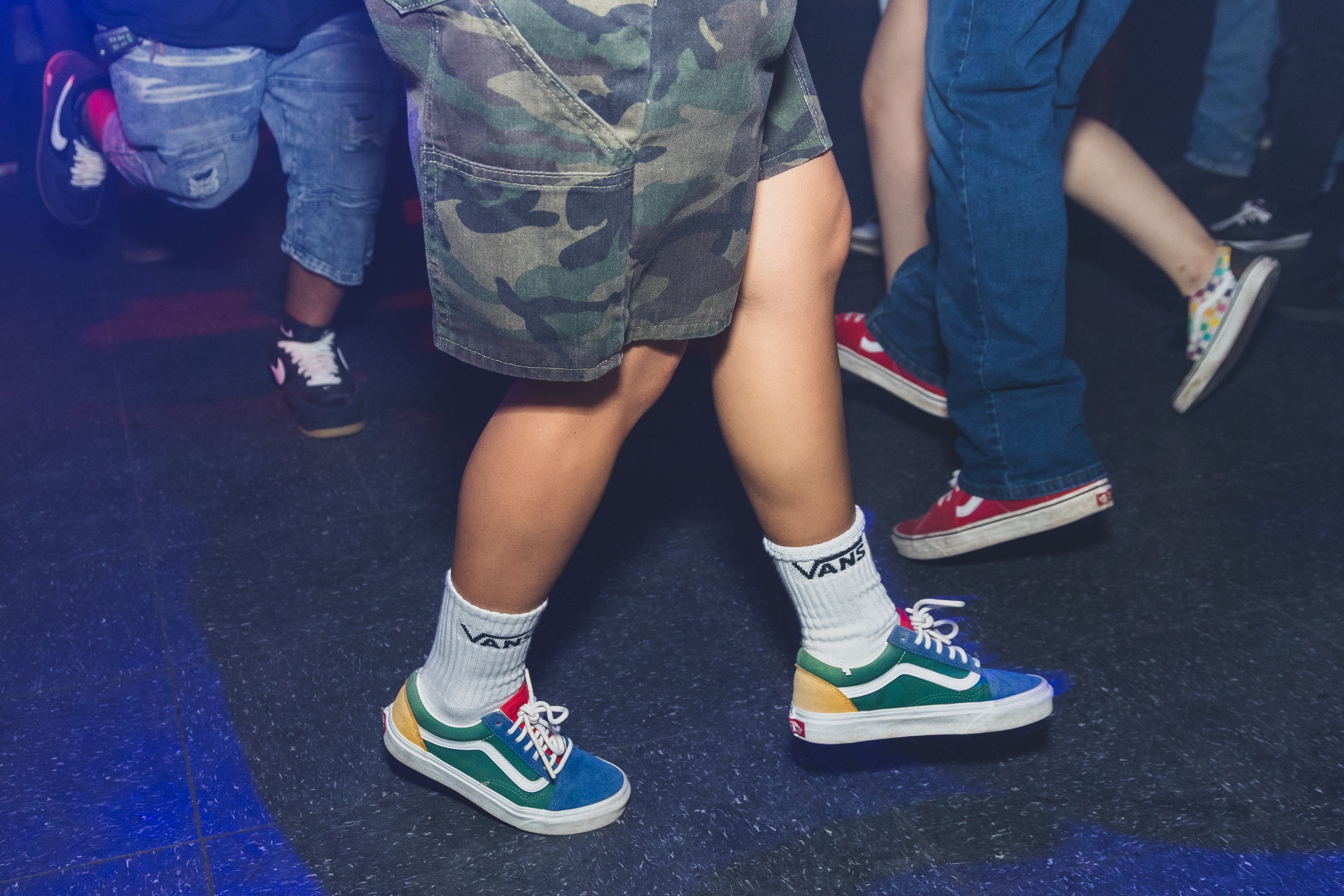 Vans Old Skool sneakers on the dance floor at SATX Emo Club